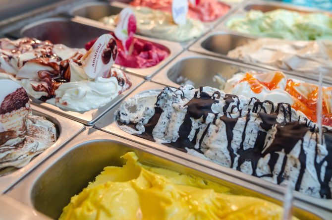 cases of gelato in a variety of different colours 